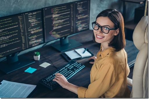 Profile side view portrait of attractive cheerful skilled girl geek developing web site cyber security at workplace workstation indoors