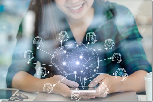 Polygonal brain shape of an artificial intelligence with various icon of smart city Internet of Things Technology over Asian businesswoman hand using the smart mobile phone,AI and business IOT concept