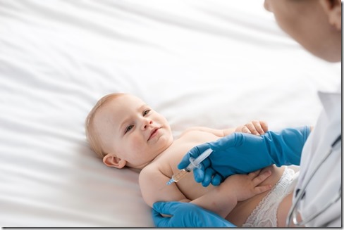 Doctor vaccinating baby in clinic. Little baby get an injection. Pediatrician vaccinating newborn baby. Vaccine for infant child. Child's Immunization, Children's Vaccination, Health concept