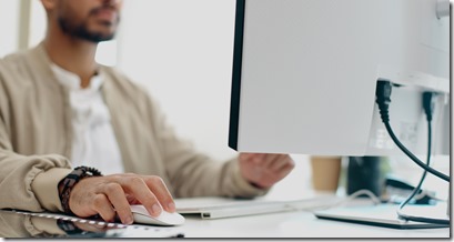 Office laptop, hands and businessman typing feedback review of social media, customer experience or.